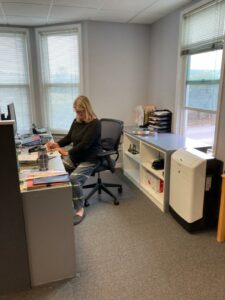 Elizabeth Susskind working in Walden's office