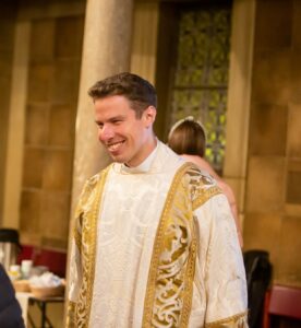 Peter Thompson wearing liturgical vestments
